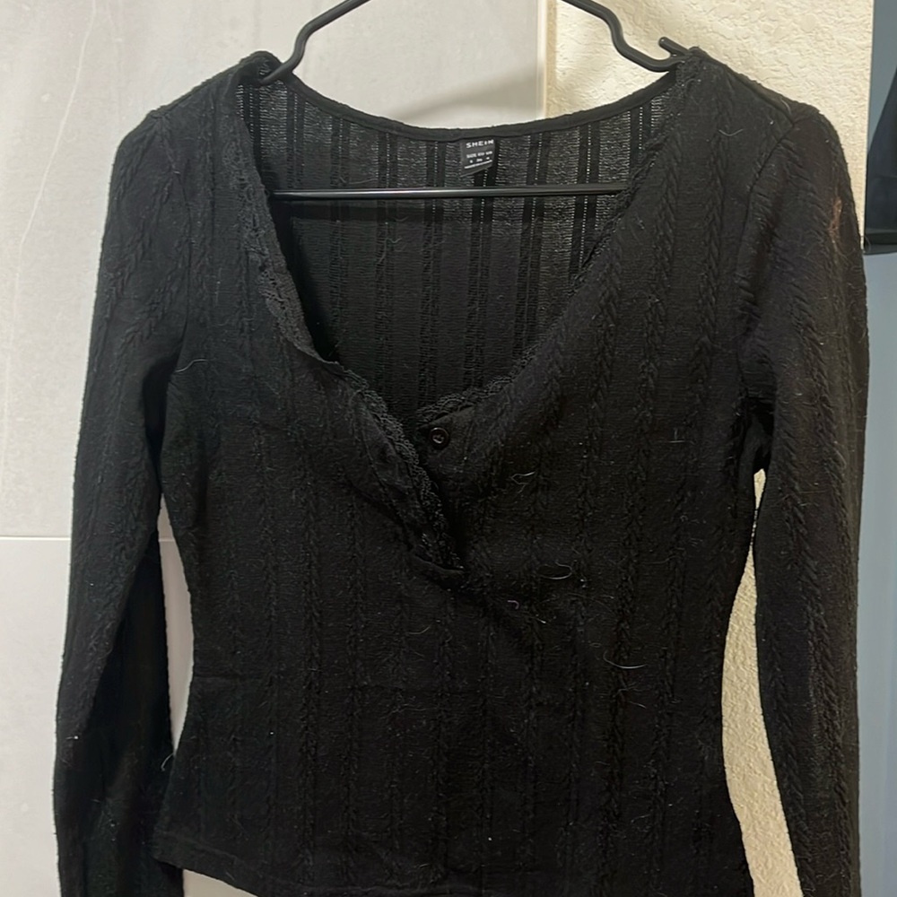 Black long sleeve with cable knit design